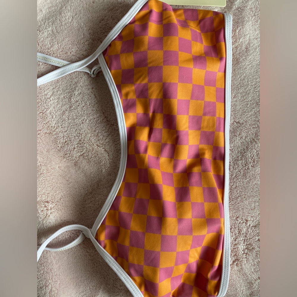New with tags women swim top. Size medium with pads